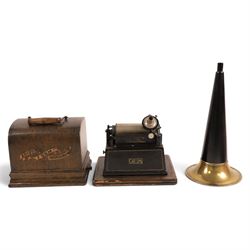 Early 20th century Edison GEM phonograph, in oak case, serial number G72256, with brass and black horn and a collection of wax cylinders