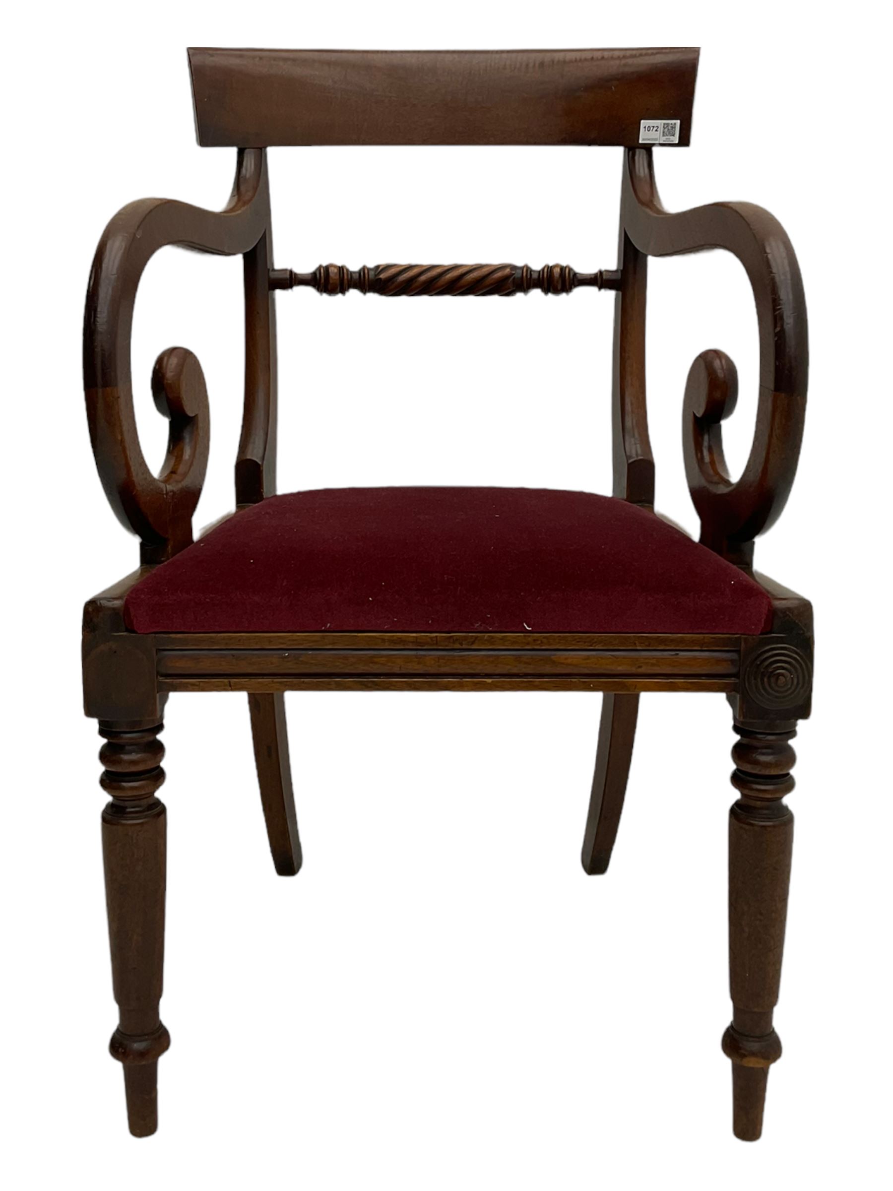 Seven early 19th century mahogany dining chairs - set six side chairs with scroll carved middle rails (W46cm), and a carver elbow chair with rope twist middle rail