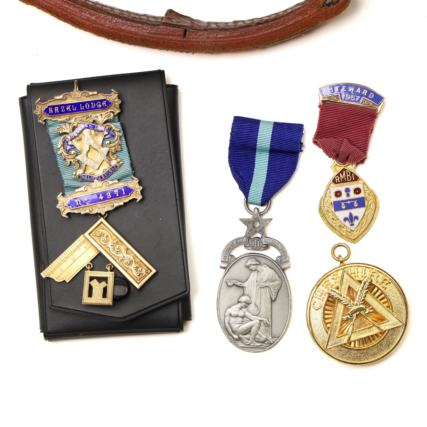  Masonic Regalia including silver gilt and enamel Past Masters jewel from the Hazel Lodge, other gilt metal jewels, leather aprons etc in case