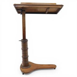 Late Victorian mahogany adjustable reading stand, the rectangular top with moulded and rounded edge and gallery upon a adjustable turned column support, and shaped base