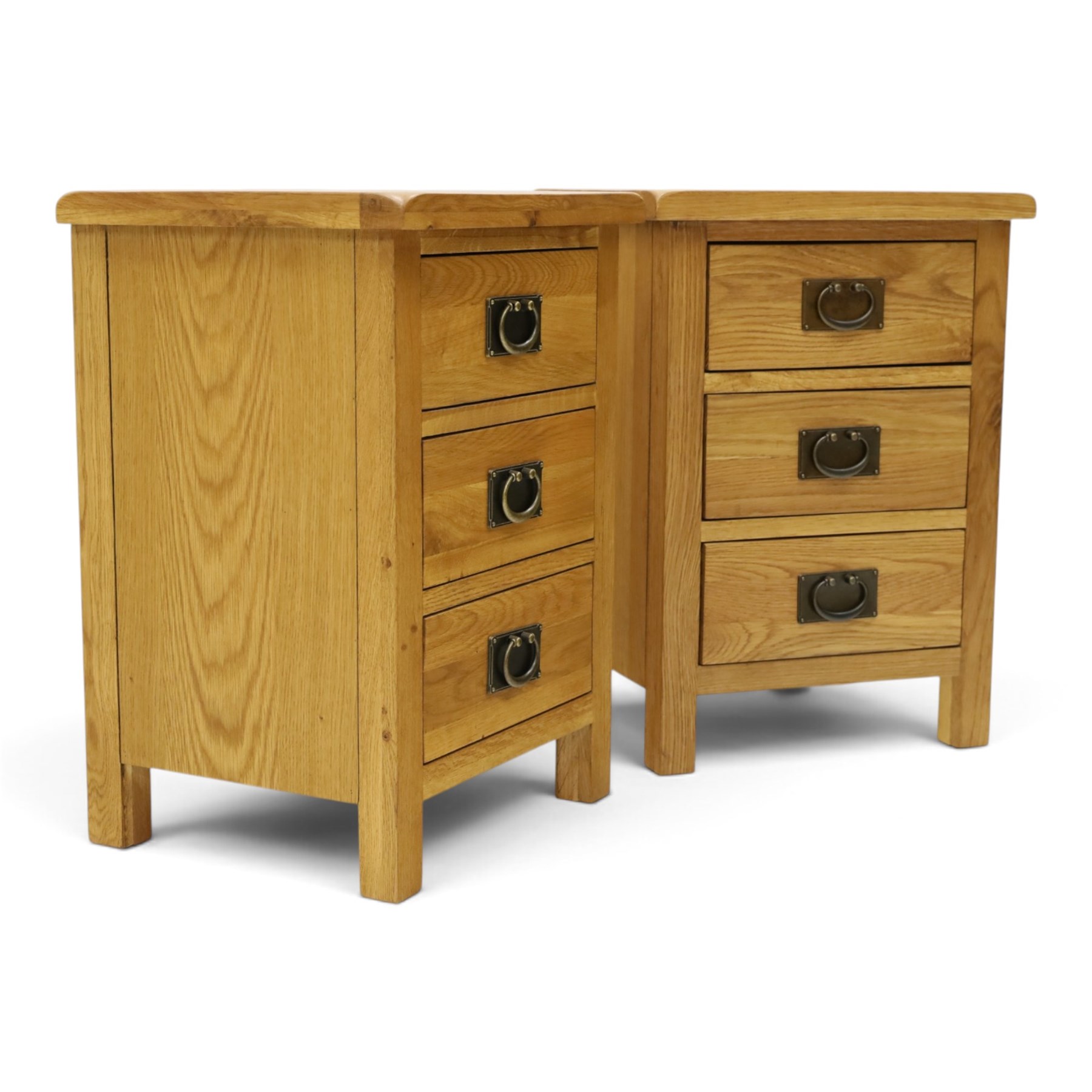 Pair of solid light oak bedside chests, rectangular top over three graduating drawers with metal handles and plates, on square feet