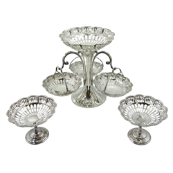 Early 20th century matched silver epergne, open work design, the centre piece with three branches and baskets by Synyer & Beddoes, Birmingham 1913, the two pedestal bon bon dishes by Mappin & Webb Ltd, Birmingham 1915, H21cm, approx 25.2oz