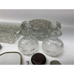 Glass dressing table tray, scent bottles and lidded bowl, metal mounted foliate design hair brushes and handheld mirrors etc