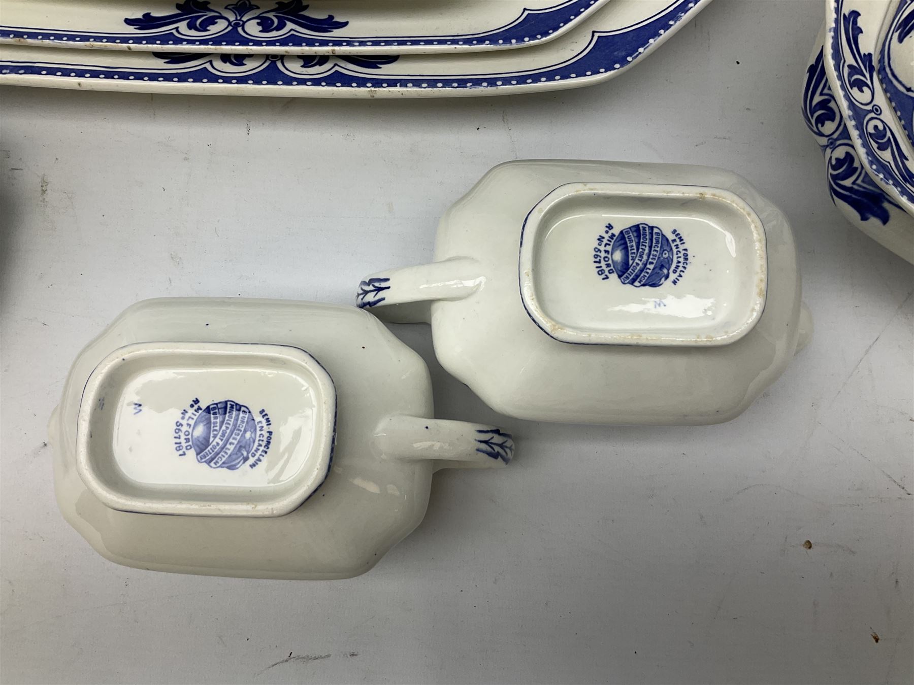 Burgess and Leigh Middleport pottery dinner wares decorated in the ‘Milford’ pattern, to include lidded tureens, graduated meat plates, dinner plates etc 