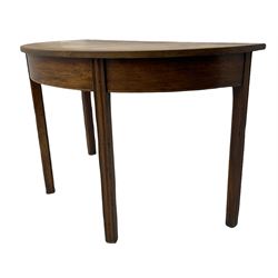 Early 19th century mahogany demi-lune table, on square moulded supports