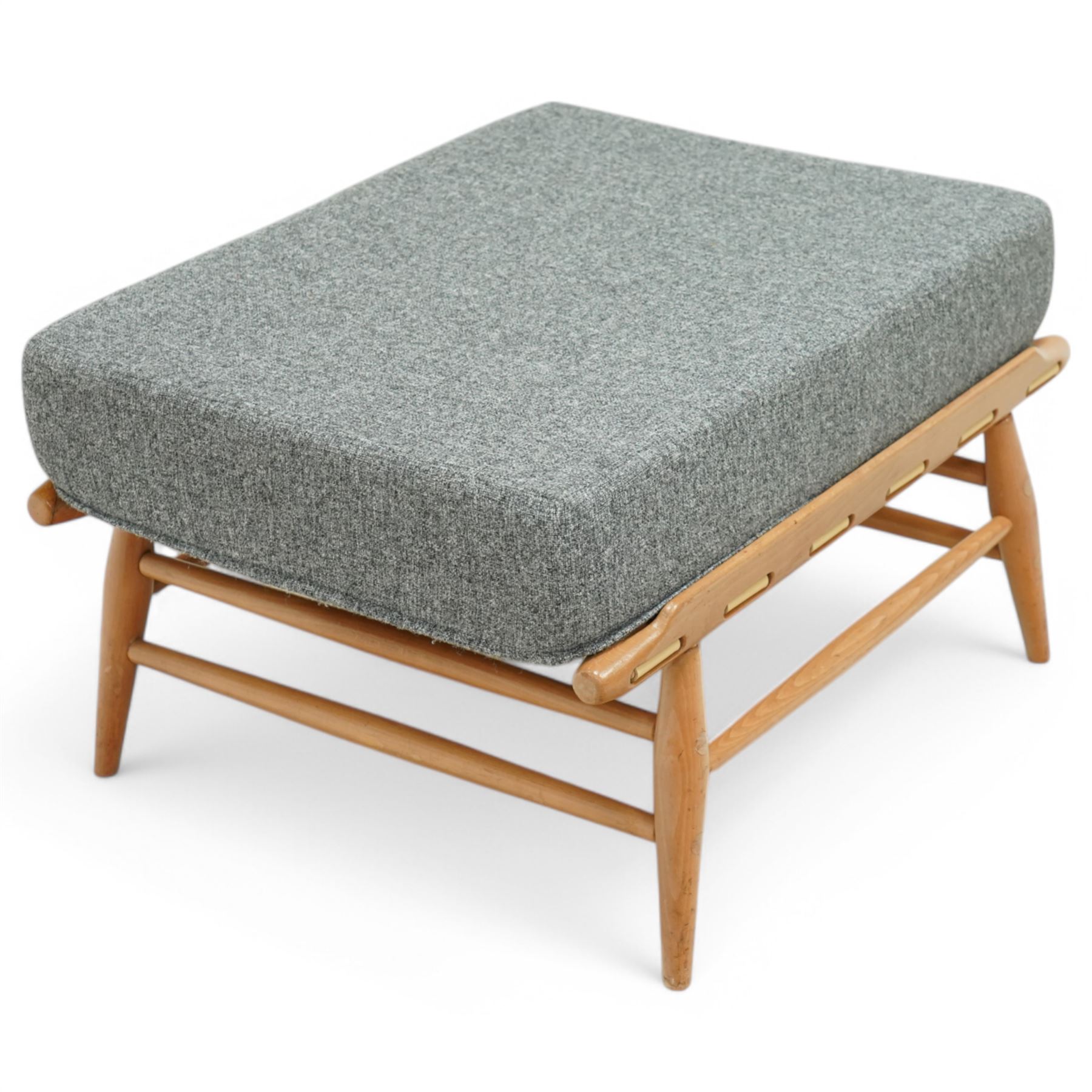 Lucian Ercolani for Ercol - footstool model number 443, upholstered in grey fabric, on elm and beech base 