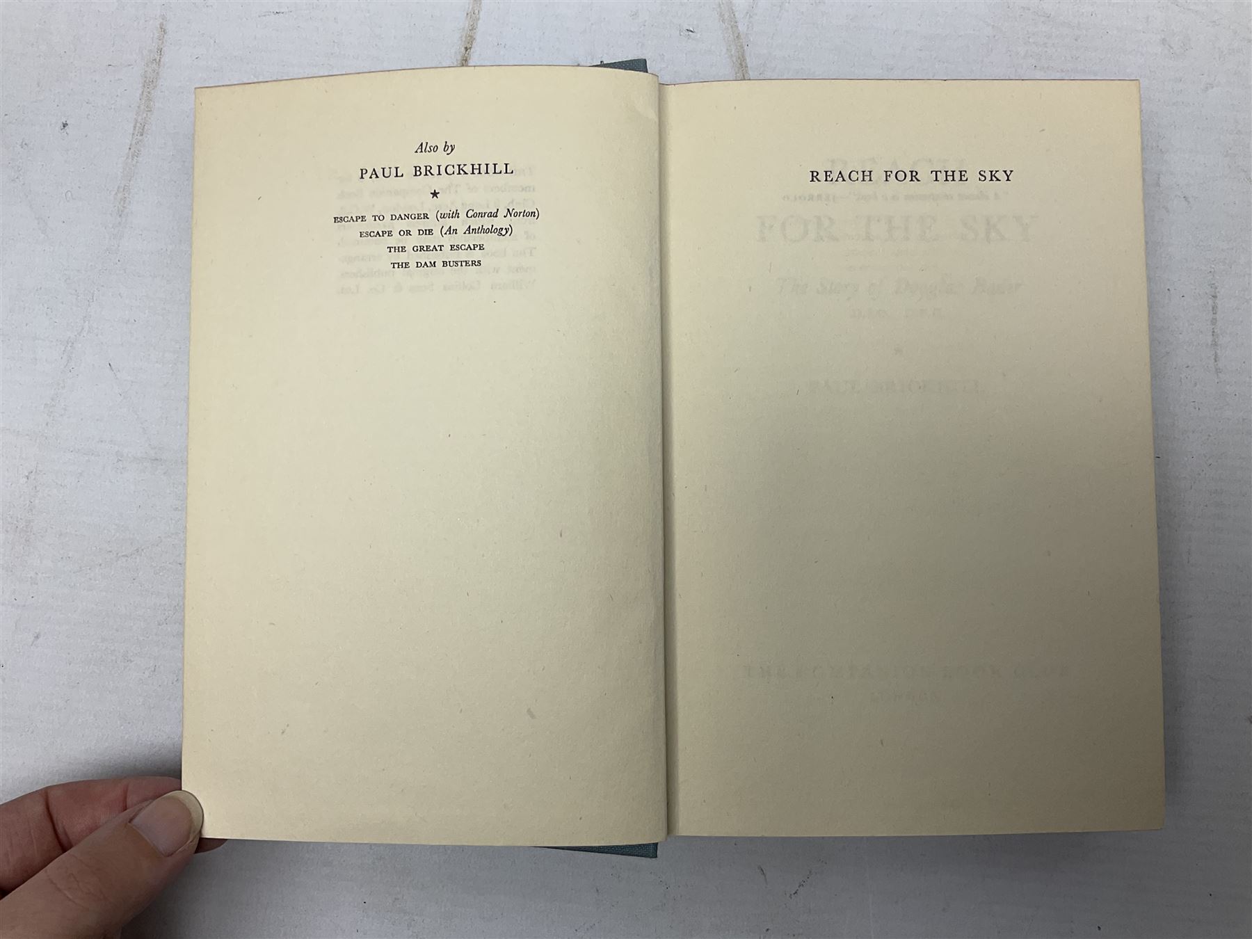 Douglas Bader signature - Reach For The Sky by Paul Brickhill. 1955 Companion Book Club Edition. Signed on the fep and dated 8/10/79.