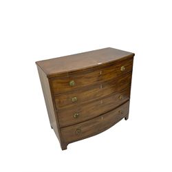 Regency mahogany bow front chest, the top with ebony and satinwood stringing, fitted with four cockbeaded drawers with brass pull handles and bone escutcheons, on bracket feet