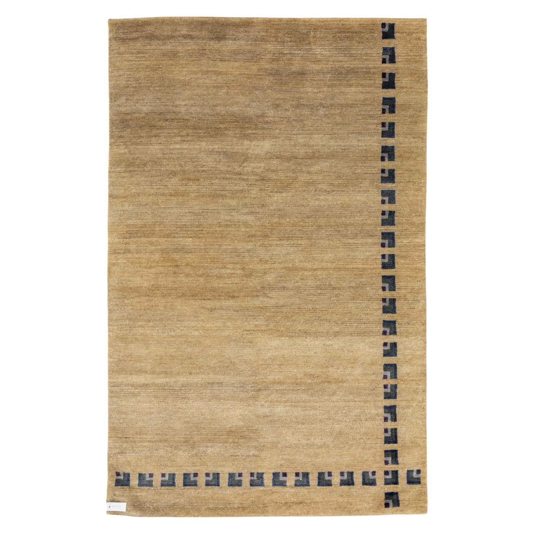 Rugs by Design - ‘Silk Stone’ Nepalese thick pile wool rug, with plain textured camel ground and geometric border detail in blue, grey and dark tones to two sides