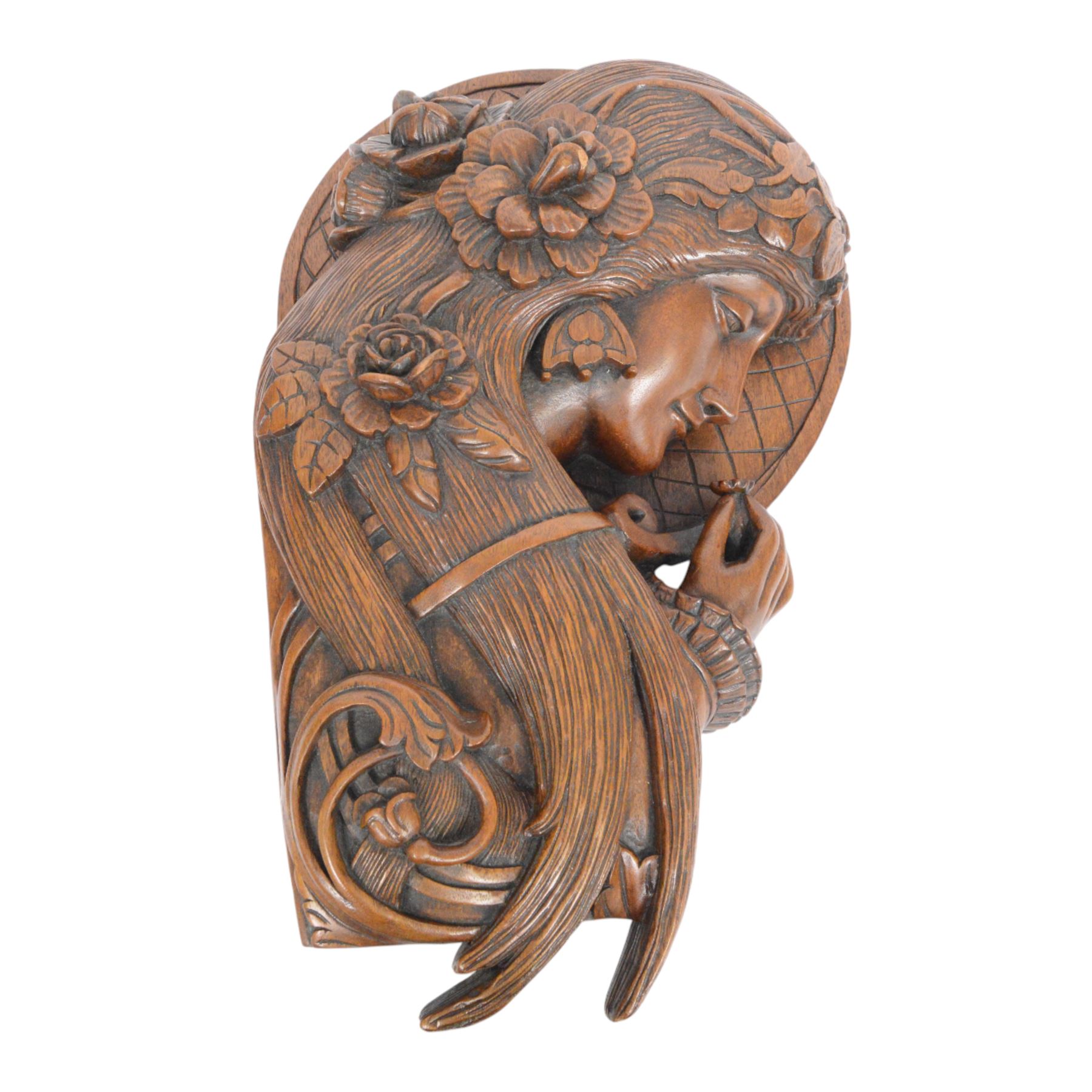 Art Nouveau style wall hanging,  carved as a woman holding a flower, H55cm