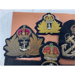 Quantity of WW1 and later Royal Navy and RAF cloth and metal badges and insignia