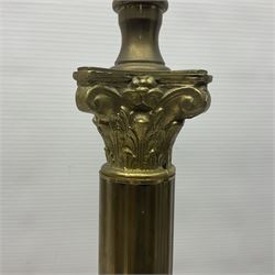 Brass table lamps in the form of Corinthian column, upon a stepped footed base, H65cm