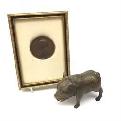  Bronze figure of a wild pig with bell collar L9.5cm and framed bronze RHS medallion (2)  