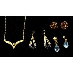 18ct gold single stone diamond wishbone necklace and three pairs of 9ct gold stud earrings including sapphire and diamond chip, pear shaped topaz and garnet cluster