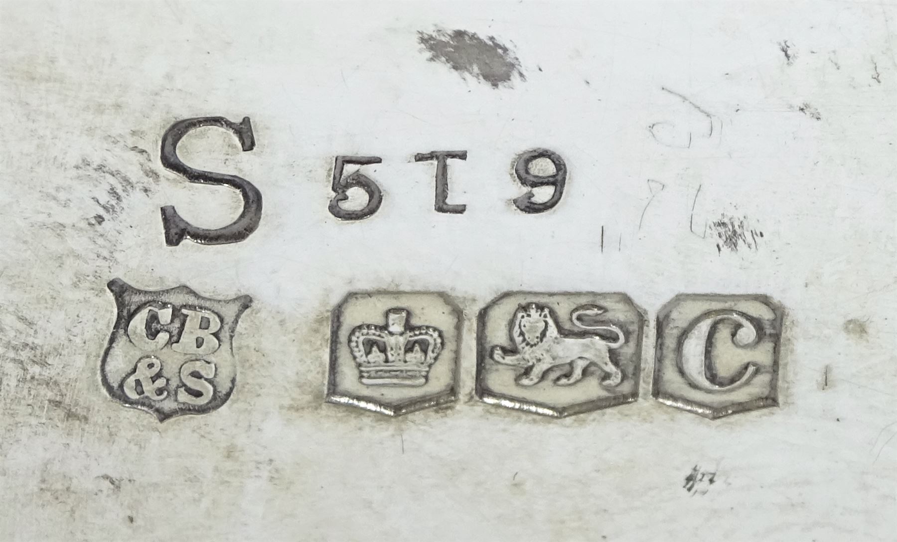 Raich Carter - presentation hallmarked silver two-handled tray of rounded oblong form with gadrooned rim by Wilson & Gill, 139 Regent Street, London, inscribed to the centre 'Presented to Mr. & Mrs. Raich Carter by the Lord Mayor of the City and County of Kingston-upon-Hull Alderman R.E. Smith J.P. on May 30th 1952on behalf of the many Admirers who subscribed to The Lord Mayor's Testimonial Fund in recognition of Raich Carter's genius as a footballer and his services to the City', London 1937 82oz L61cm; together with a hallmarked silver four-piece tea and coffee set by Cooper Bros. & Sons Ltd, the teapot of London shape with ebonised handle and knop, each piece engraved with an initial 'C', Sheffield 1920  60.5oz, teapot L29.5cm