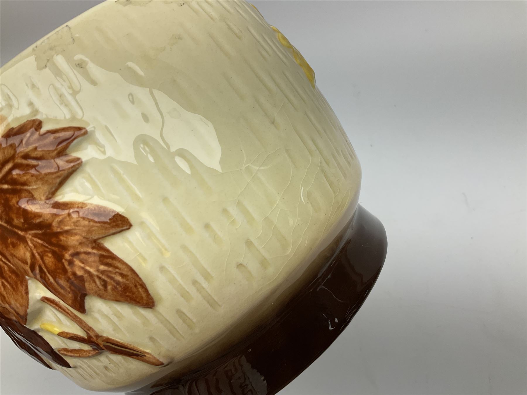 Two Royal Crown Derby pattern Imari soup bowls, pattern 2451, Belleek Fermanagh Ireland four piece set in green shamrock pattern, Royal Doulton small lady figure, Marie HN1370, large Wedgwood fruit bowl, Sylvac jardiniere in autumn leaves pattern, five pieces Co-operative Society commemorative ceramics, with selection of other ceramics. 