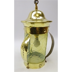  Arts and Crafts hammered brass dome top hall lantern, cylindrical vaseline glass shade and tapered strap work supports with circular embossed motif, H40cm (excluding chain)  