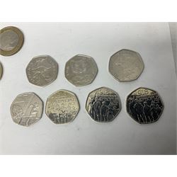 The Royal Mint United Kingdom mostly commemorative two pound, old round one pound and fifty pence coins, overall face value approximately 110 GBP, housed in three 'Coin Hunt' folders and loose