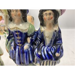 Quantity of Victorian and later Staffordshire style figures, to include examples upon horseback, sheep, drummer etc