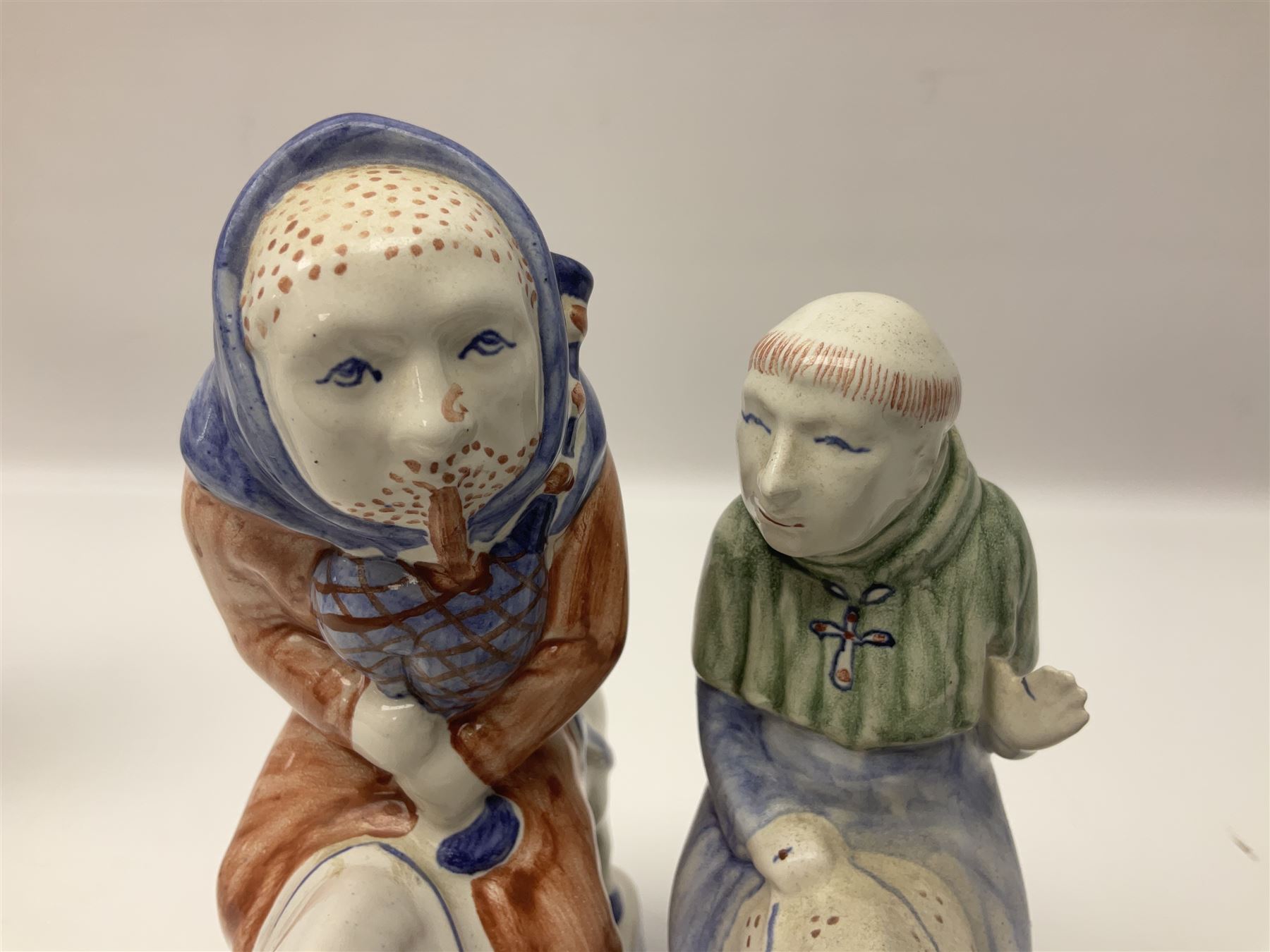 Three Rye Pottery Canterbury Tales figures, comprising The Miller, The Monk and The Franklin, together with a Canterbury Tale tile The Knight, tallest H24cm