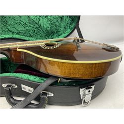 Eastman eight-string mandolin model MD504, serial no.140435406, L66cm; in TGI hard carrying case; together with case of instructional CDs