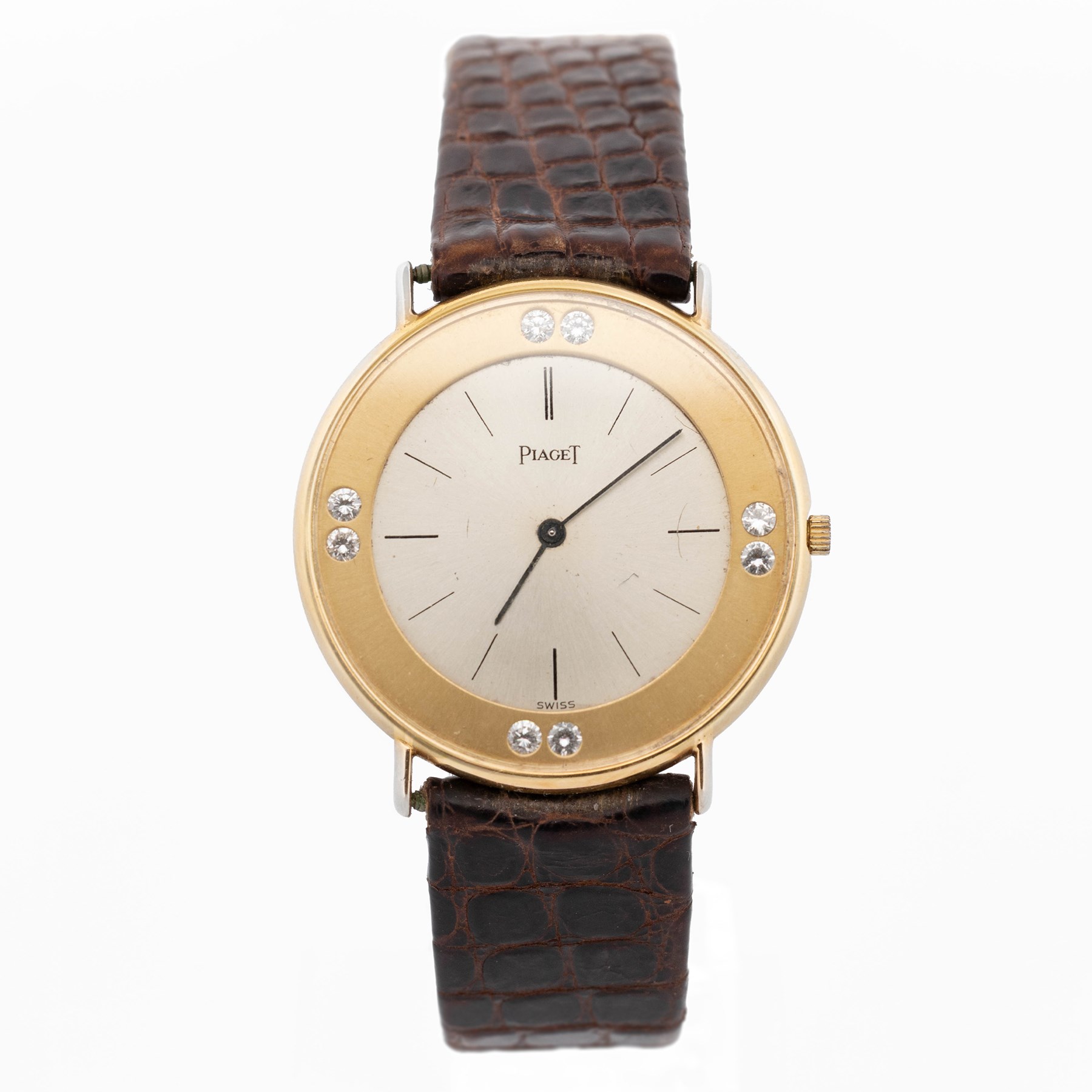 Piaget Altiplano ultra thin 18ct gold diamond set manual wind wristwatch, Ref. 2642, Cal. 20P2, silvered dial with baton hour markers, the gold outer ring set with eight round brilliant cut diamonds, on brown leather strap with Piaget 18ct gold buckle and 18ct gold diamond set spacer
