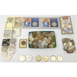  Collection of world coinage including 1921 Morgan dollar S mintmark (with pendant loop soldered to edge of coin), three 1966 Canadian silver dollars, two five pound coins, various world coins etc  