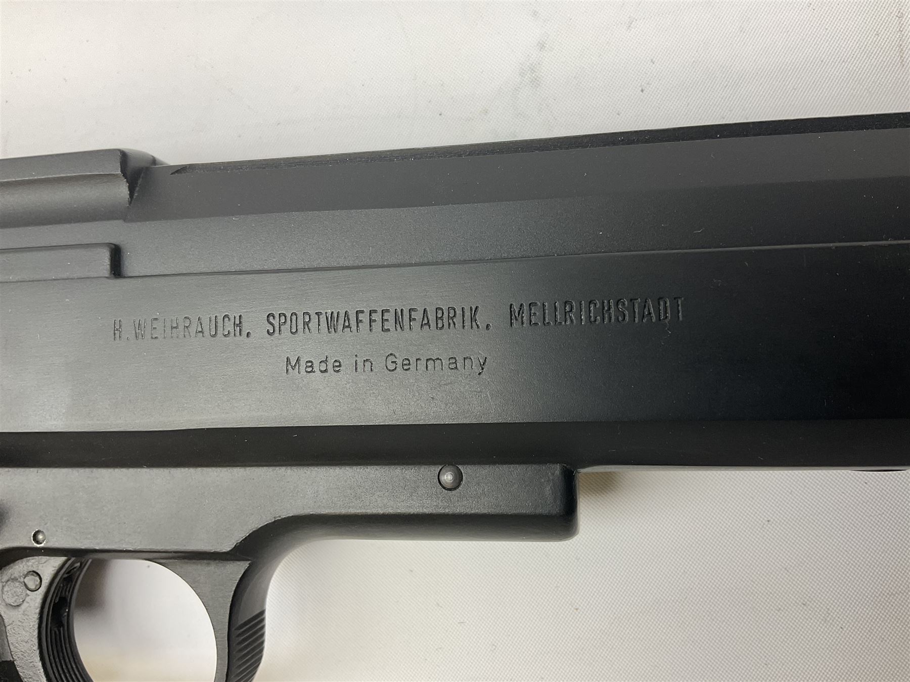 H. Weihrauch HW45 air pistol, .177 calibre, over-lever mechanism, chequered grip No.372679 L31cm; and quantity of pellets