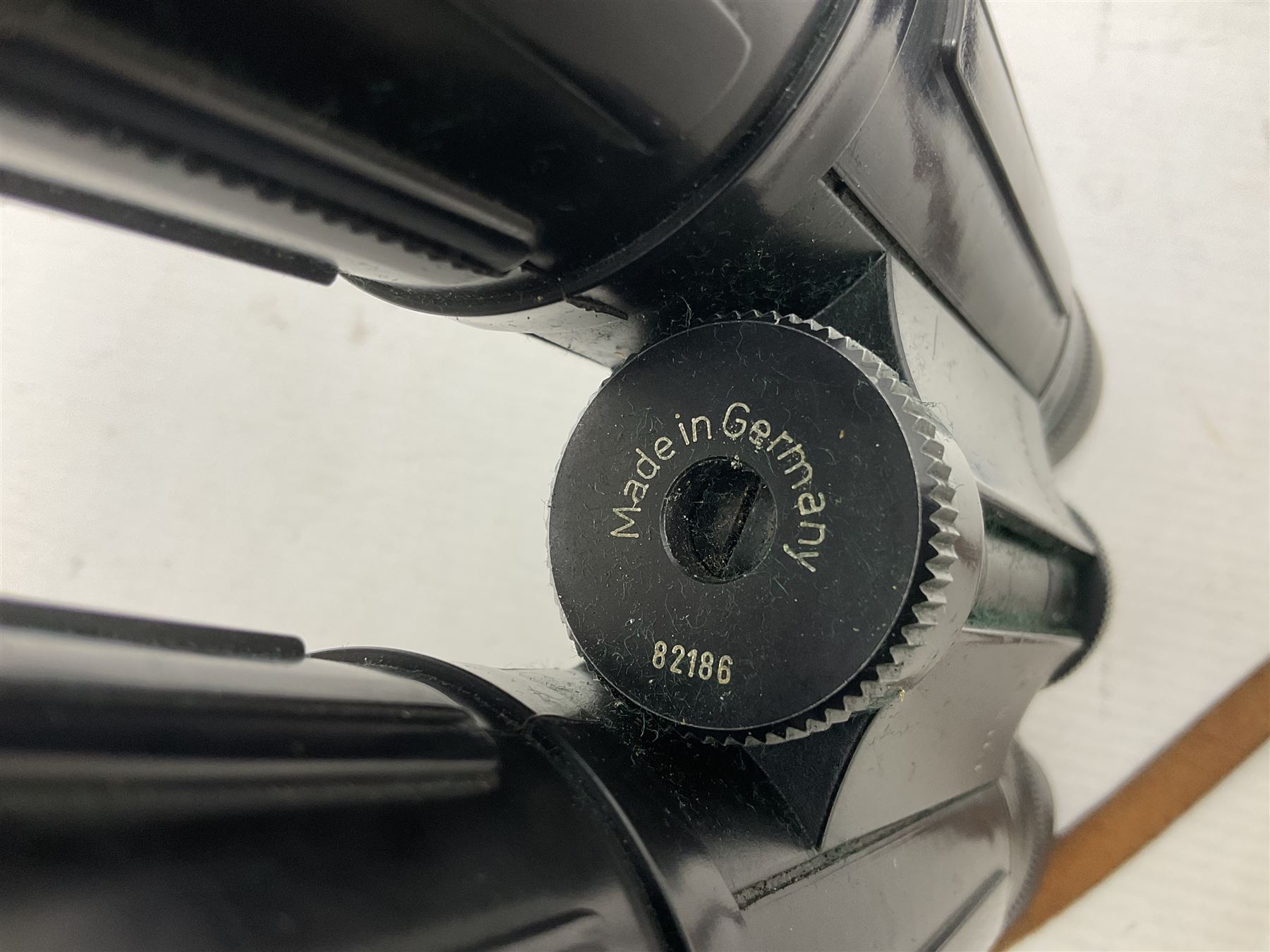 Pair of Optolyth 12 x 63 binoculars, made in Germany, serial no 82186, in leather case