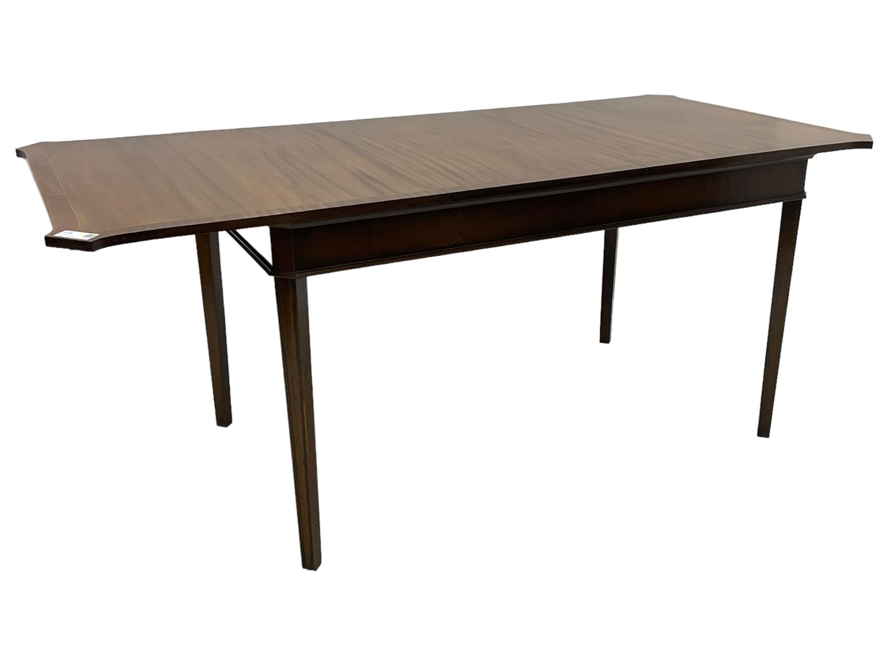 Regency design mahogany extending dining table, rectangular top with extending canted corners, pull-out action with additional leaf (84cm x 136cm - 182cm, H76cm); set of eight Regency design mahogany dining chairs with rope twist rails