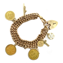  Hallmarked 9ct gold curb chain bracelet with two loose mounted half sovereigns, a further half sovereign, three 9ct charms and heart padlock  