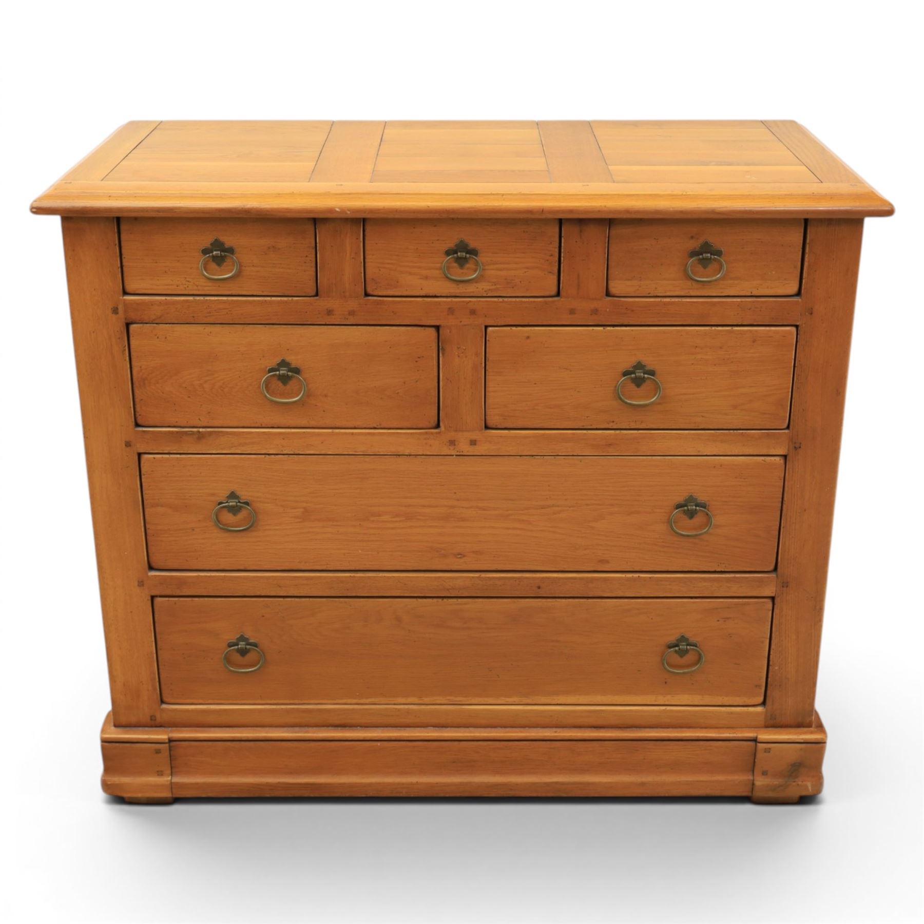 Solid oak chest, fitted with an arrangement of five short and two long drawers