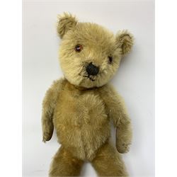 Two 1930s Chiltern type graduated teddy bears, one wood wool and one wood wool and kapok filled plush bodies, each with swivel revolving head, applied eyes and vertically stitched nose and mouth and jointed limbs, tallest H20.5