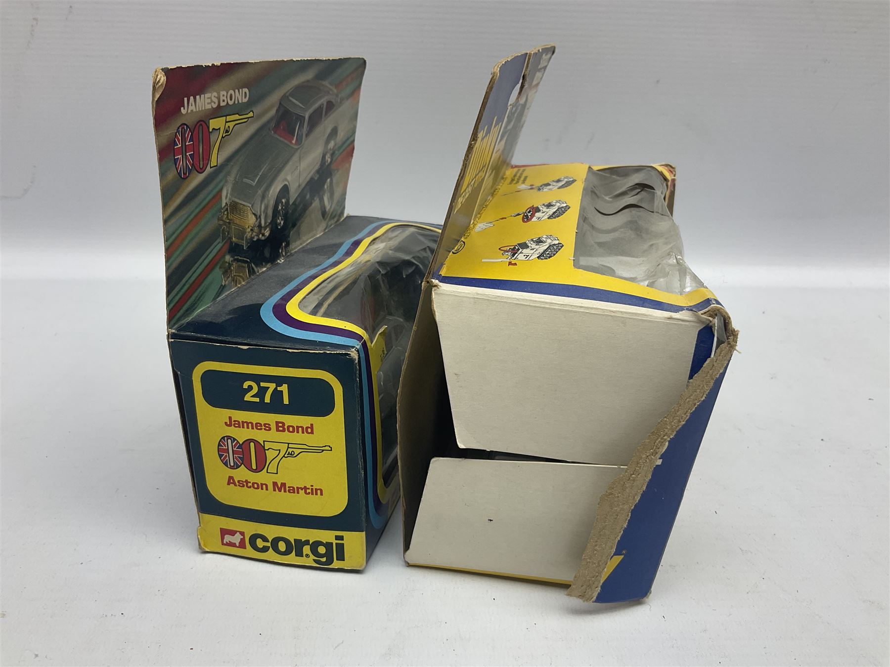 Corgi - die-cast model of James Bond Aston Martin DB5 No.271 with silver body and red interior, gold bumpers and four-spoke wheels, James Bond and two bandit figures; original window box with header card; and Dinky Shado 2 Mobile with one missile No.353; in window box (2)