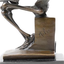 Bronze skeleton modelled as 'The Thinker', on black marble base, signed 'Milo' to plinth, H14cm