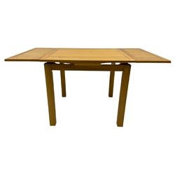 Light oak square extending dining table,  two pull out leaves