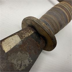 Moroccan jambiya dagger with 24.5cm plain curved blade stamped LONDON to the ricasso area, the hilt and scabbard overlaid with plain sheet brass to the back and ornate silver coloured metal to the front; waisted grip and arched pommel; two pyramid mounts to the scabbard L41cm overall; large billhook with curving blade and stacked leather washer grip; and a reproduction halberd blade (3)