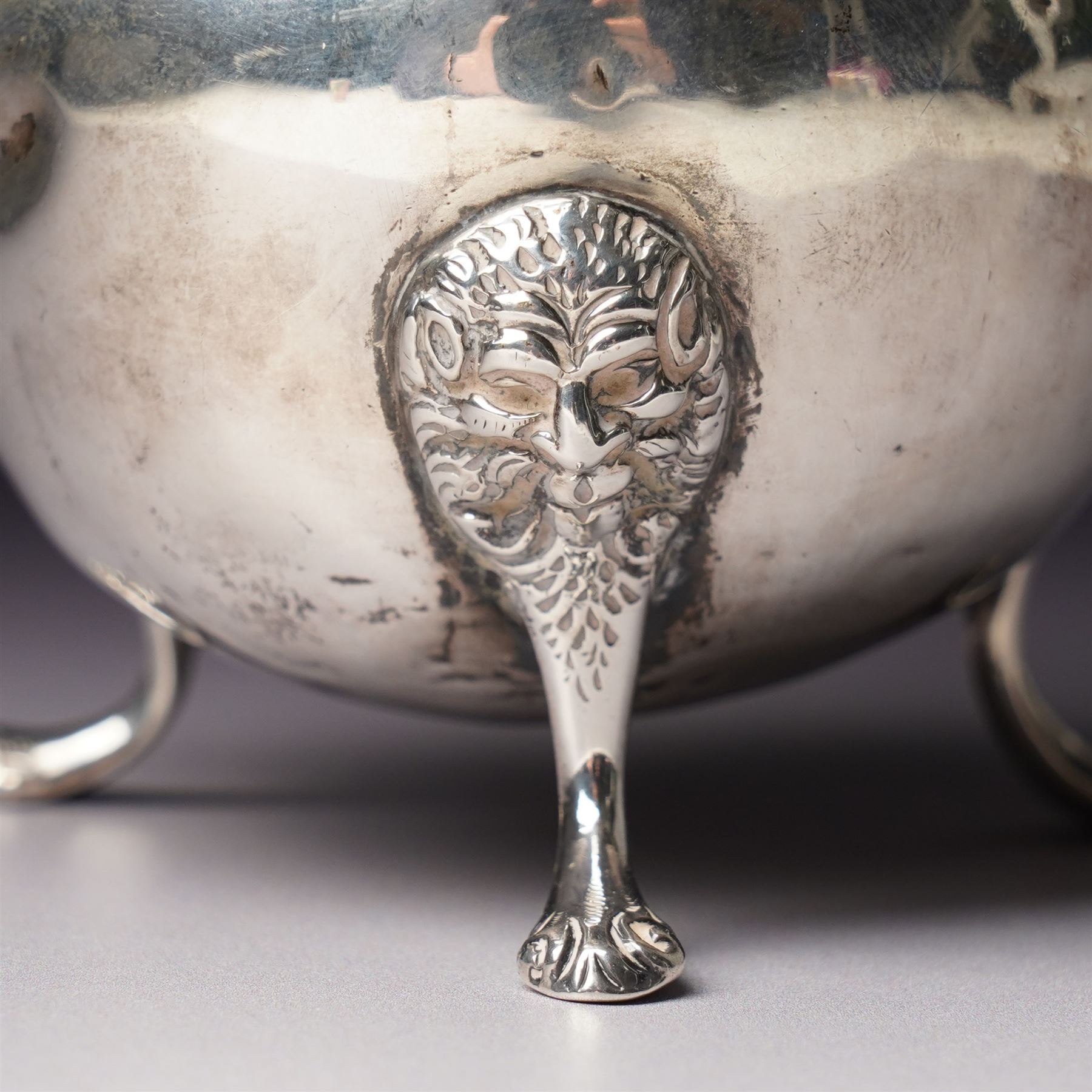 Victorian silver cream jug with crimped rim, scroll handle and lion mask supports London  1887 Maker John Aldwinckle and Thomas Slater