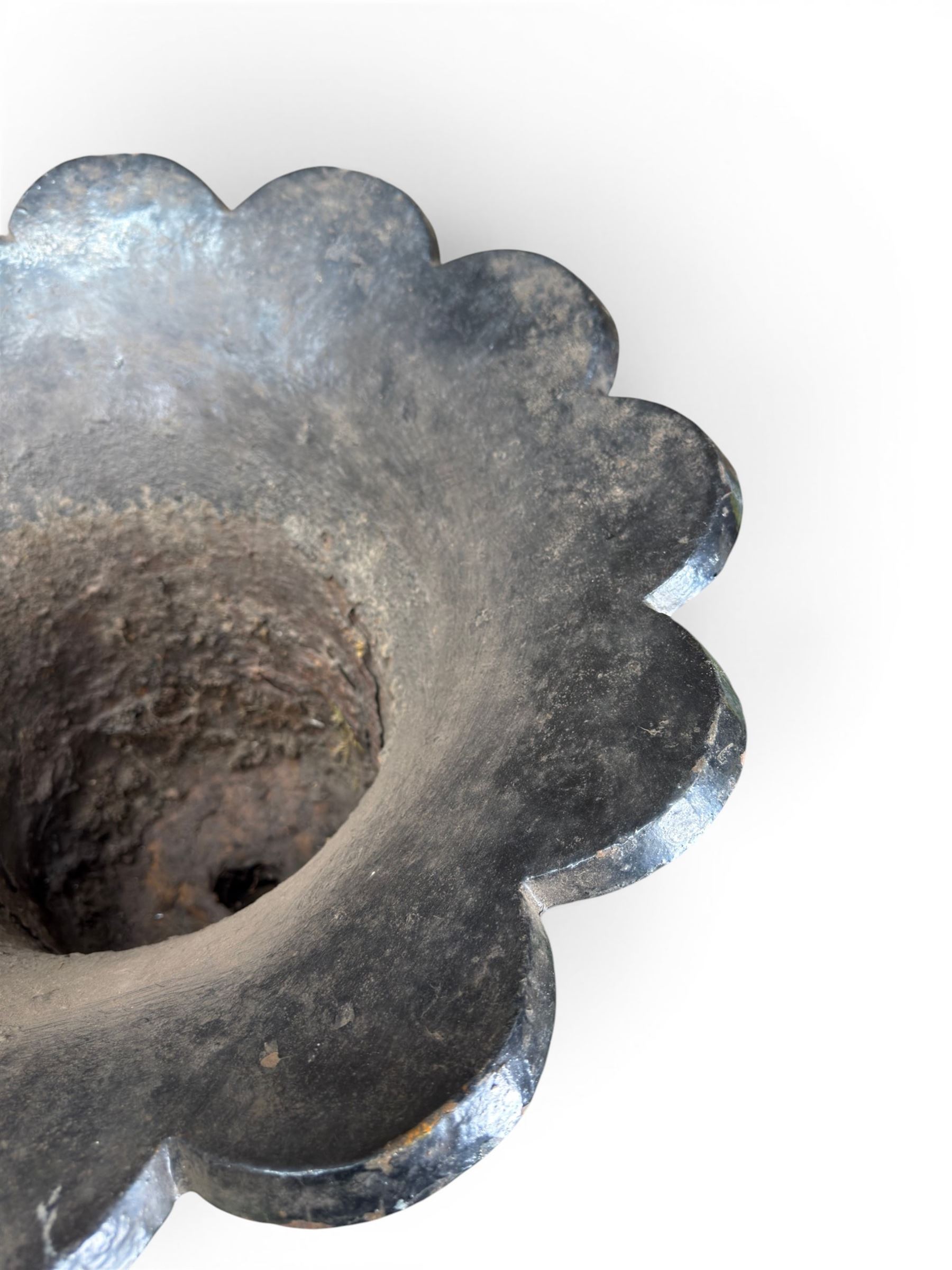 Pair of Victorian large scale cast iron garden urns, flared petal shaped rim with tapering waist, gadrooned base on square plinth, finished in black paint