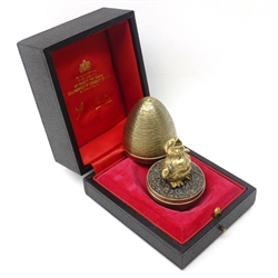  Silver-gilt 'Surprise' egg by Stuart Devlin (1931-2018) London 1971, with concentric ring texturing, the interior with gilded standing chick on grey ground, H7.5cm, approx 5oz in original fitted case  