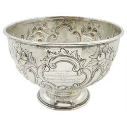 Edwardian silver rose bowl, the part fluted bowl embossed with acanthus leaves, flower heads and C scrolls and personally engraving 'S.S Rievaulx Abbey - Built By - Earle's Shipbuilding & Engineering Co Ltd - For The - Hull & Netherlands Steamship Co. Limited Launched December 23rd 1907', upon a spreading circular foot, hallmarked F Boyton & Co, London 1905, H14.5cm, D20.5cm, approximate weight 17.34 ozt (539.6 grams)