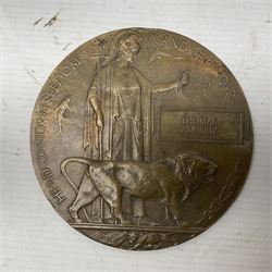 WWI group of three medals with bronze memorial plaque comprising 1914-15 Star, British War Medal and Victory Medal awarded to 16554 Pte. T. Andrew Linc. R. who died on 26th July 1916 whilst travelling to Vimy Ridge, polished and mounted for display in a frame; together with small archive of research material and two WWII V.E. Day Presentation Certificates from the people of Holbeach in Lincolnshire