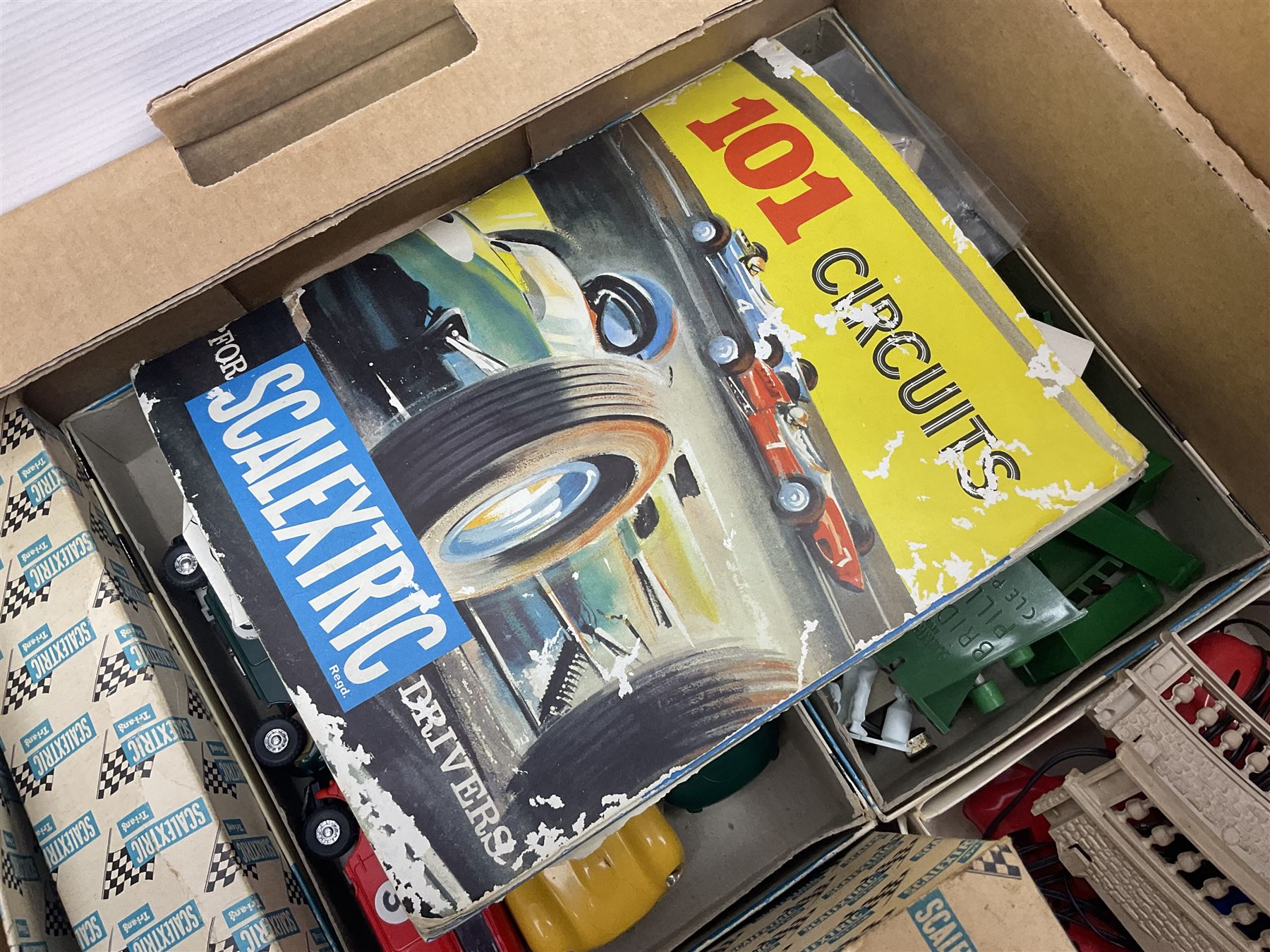 Tri-ang Scalextric - seven cars including pair of Jaguar D Types, pair of Austin Minis, Porsche and BRM racing cars etc; six various controllers and power unit, fencing, banking and bridge pillars, boxed kiosk, quantity of track and paperwork