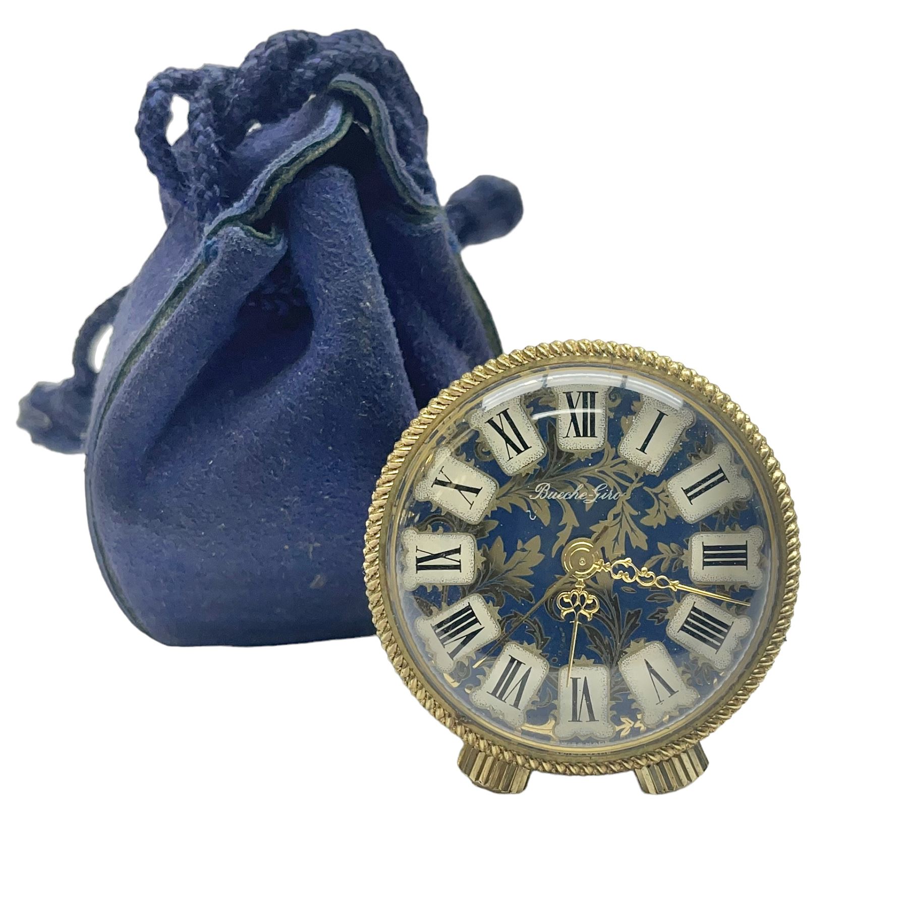 Bueche Girod silver-gilt and enamel novelty miniature clock, with a band of gilt moon and star decoration upon a deep blue enamel ground, with enamel and gilt foliate dial, with musical mechanism playing happy birthday, D2.7cm, in suede pouch