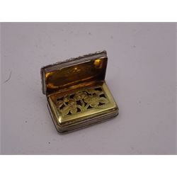 George III silver vinaigrette, of typical rectangular form, with raised foliate rim and engine turned decoration, with banded sides and foliate pierced engraving to gilt interior, hallmarked Birmingham 1797, maker's mark TS, L3cm