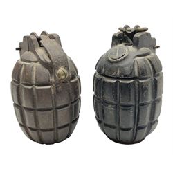 Two inert WW2 Mills Bomb (pineapple) hand grenades; one adapted as a money box with coin slit to the side and later cap H9.5cm (2)