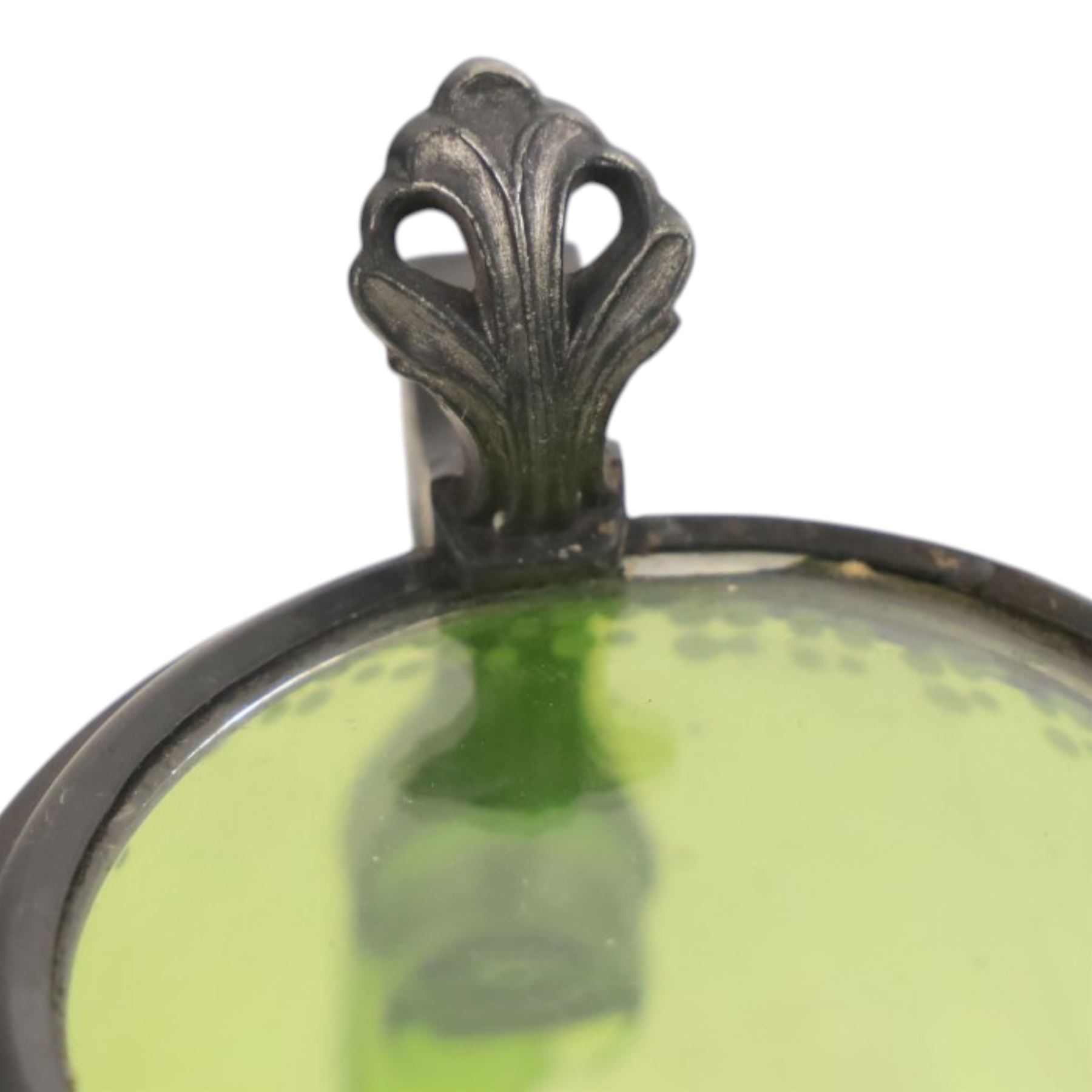 19th century German green glass stein, enamel decorated with a gentleman holding a stein, with a pewter lid, together with another smaller example decorated with a coat of arms 