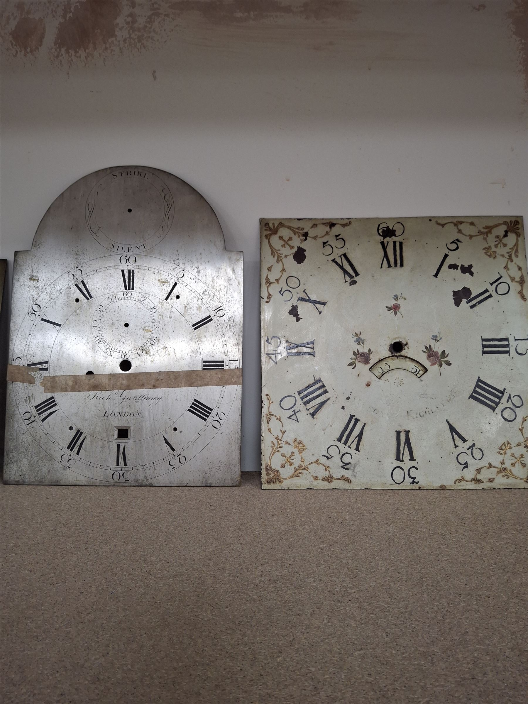 Approximately twenty-two longcase and wall clock dials, 18th century and later, included painted and brass examples