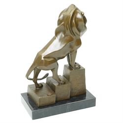After Milo - bronze model of an art deco style lion climbing steps, bearing signature and foundry mark, overall H32cm 