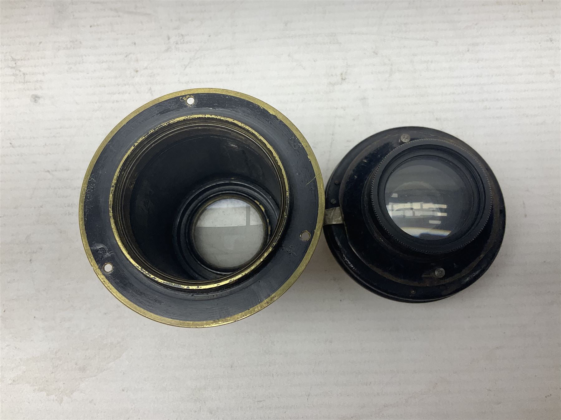 Selection of Brass Camera Lenses, to include Ross London lens 8 1/2 x 6 1/2, Beck Symmetrical lens, etc together with lens holders 
